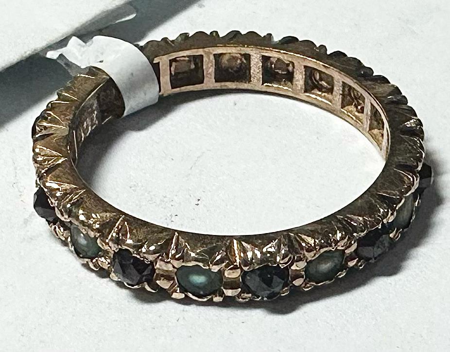 9ct yellow gold ring in size I1/2, unbranded, showcasing a smooth band with a polished finish.