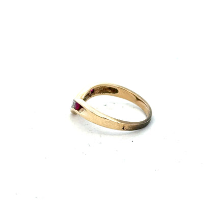 Yellow gold ring in size J, unbranded 9ct gold jewelry, showcasing a smooth, polished band with a simple, elegant design.