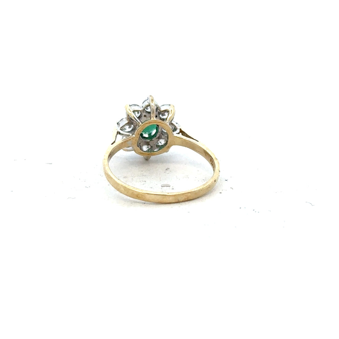 9ct yellow gold ring size J, unbranded, with a smooth polished finish, shown from a side angle in the image.