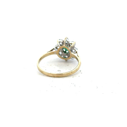 9ct yellow gold ring in size J with a smooth band, unbranded, shown from a side angle.