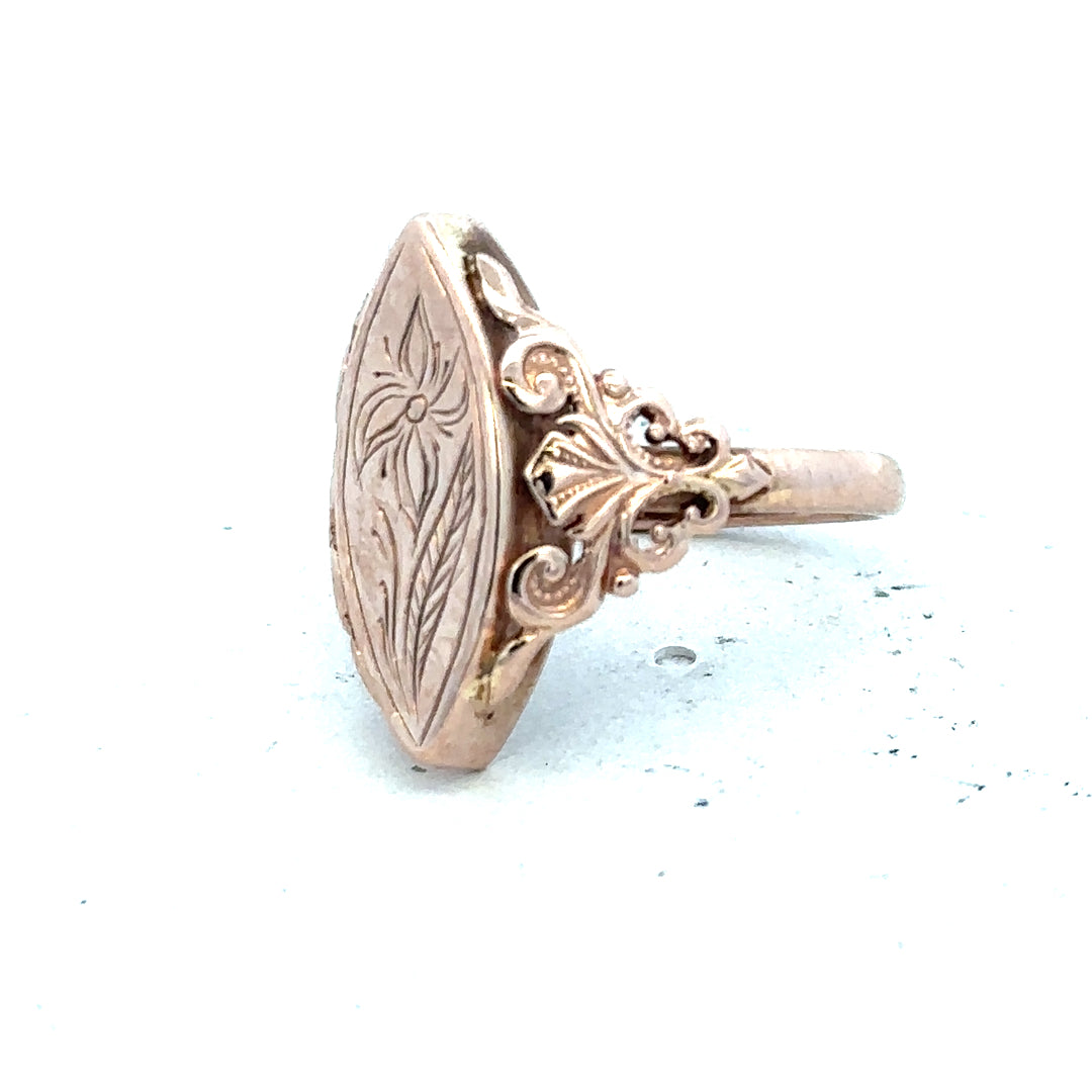 9ct yellow gold ring in size J with a smooth band, unbranded, showcasing its shiny finish and elegant design.