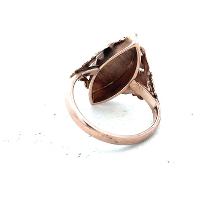 9ct yellow gold ring in size J with a smooth band, unbranded jewelry showing a polished gold finish and classic design.