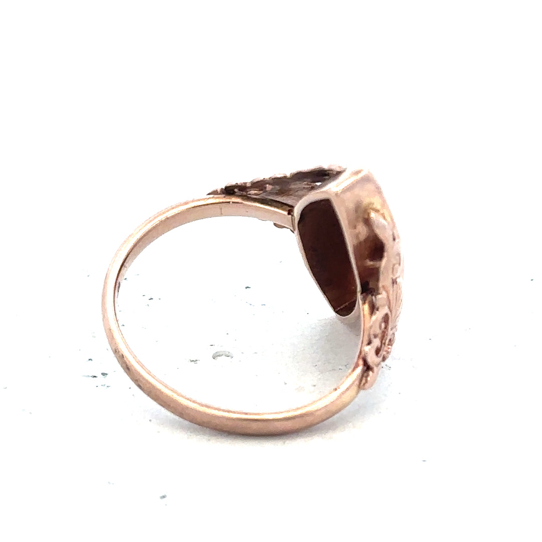 9ct yellow gold ring in size J, featuring a smooth band design, unbranded jewelry piece with polished finish.