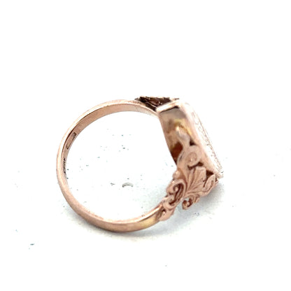 9ct yellow gold ring in size J with a simple, polished band, unbranded, showcased on a neutral background.