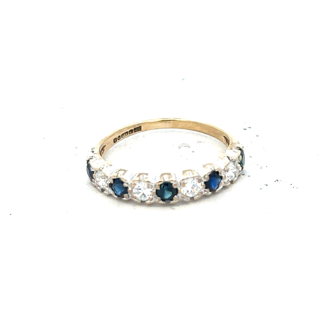 9ct yellow gold ring in size J with a smooth band, unbranded jewelry piece showcasing classic gold craftsmanship.