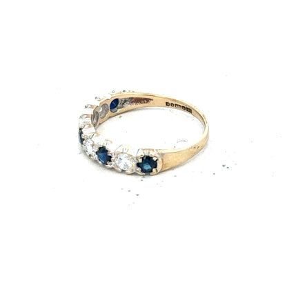 9ct yellow gold ring in size J with a smooth band, unbranded jewelry piece, shown in a close-up image.