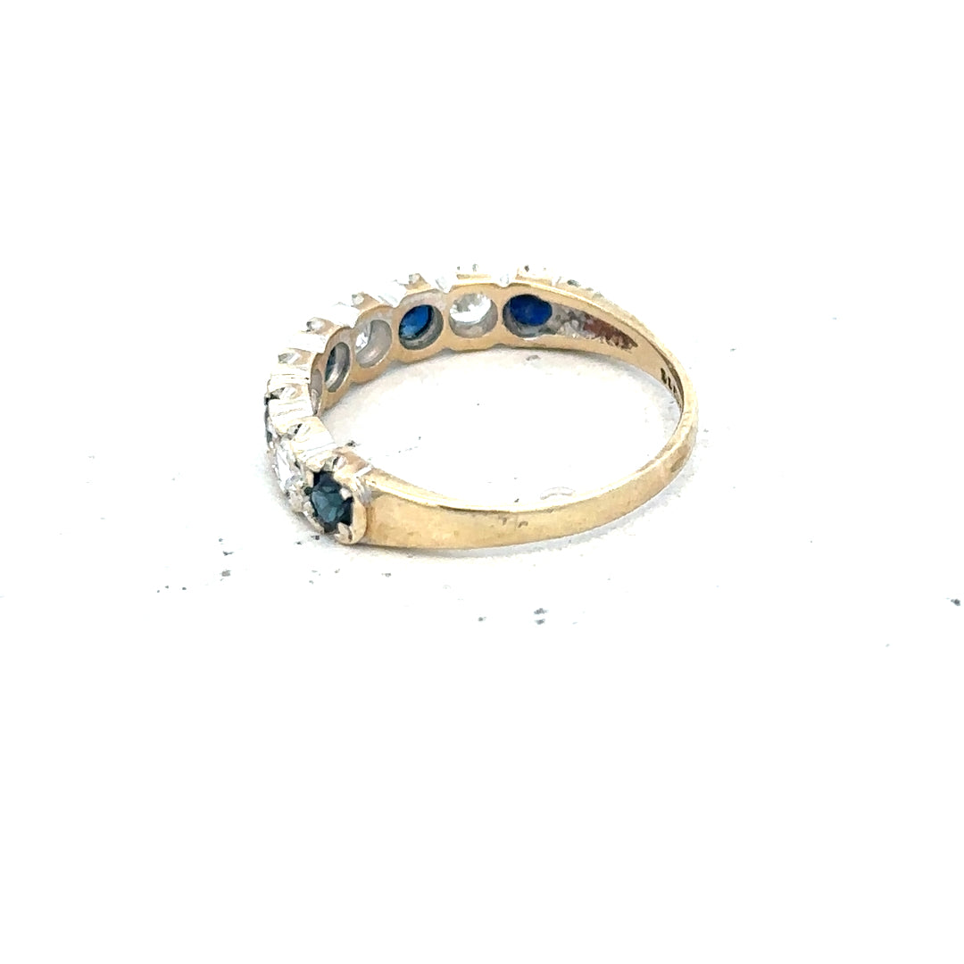 9ct yellow gold ring in size J with a smooth band, unbranded jewelry, showcasing a shiny polished finish.