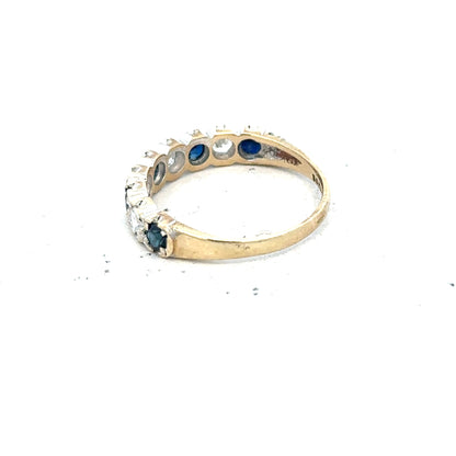 9ct yellow gold ring in size J with a smooth band, unbranded jewelry, showcasing a shiny polished finish.