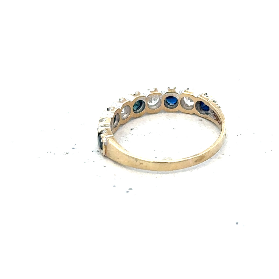 9ct yellow gold ring in size J, unbranded, featuring a smooth polished band with a classic design.