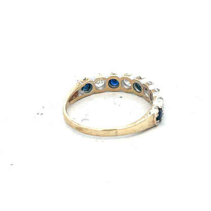 9ct yellow gold ring in size J with a smooth band, unbranded, displayed against a neutral background.