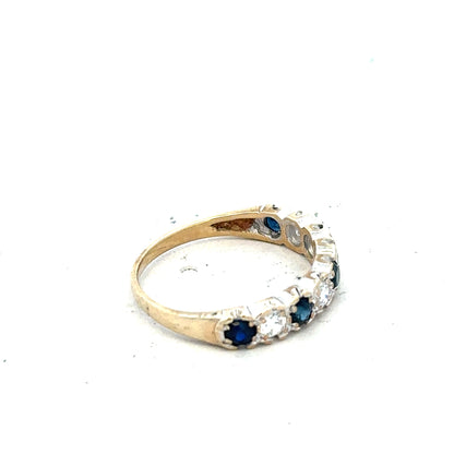 9ct yellow gold ring in size J with a smooth band, unbranded jewelry, showing a close-up of the elegant, polished design.