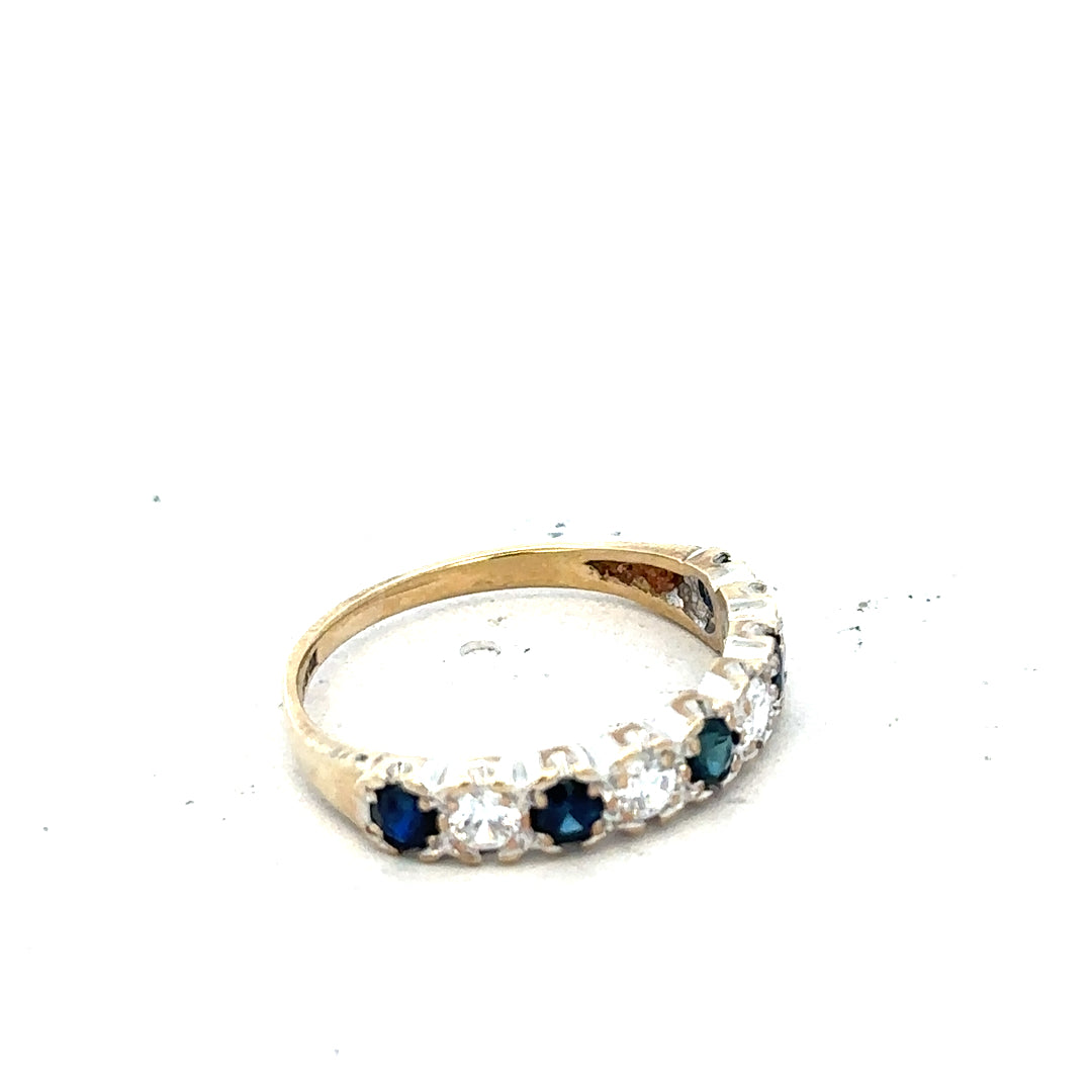 9ct yellow gold ring in size J, showcasing a smooth polished band with a classic design. Unbranded jewelry piece.