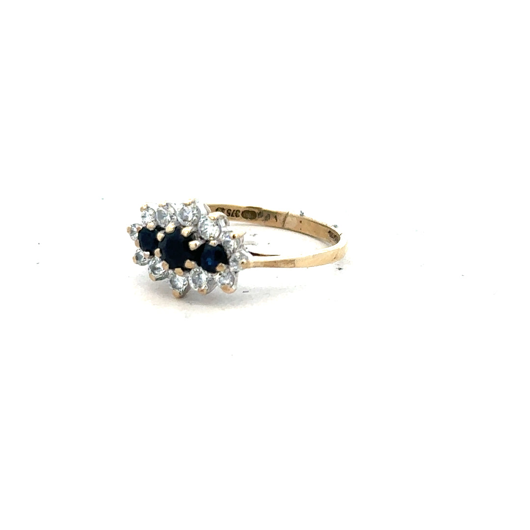 9ct yellow gold ring in size J1/2, unbranded, showcasing a sleek, polished band with a smooth finish.