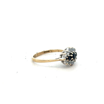 9ct yellow gold ring size J 1/2 with smooth band, unbranded jewelry, displayed on a neutral background.