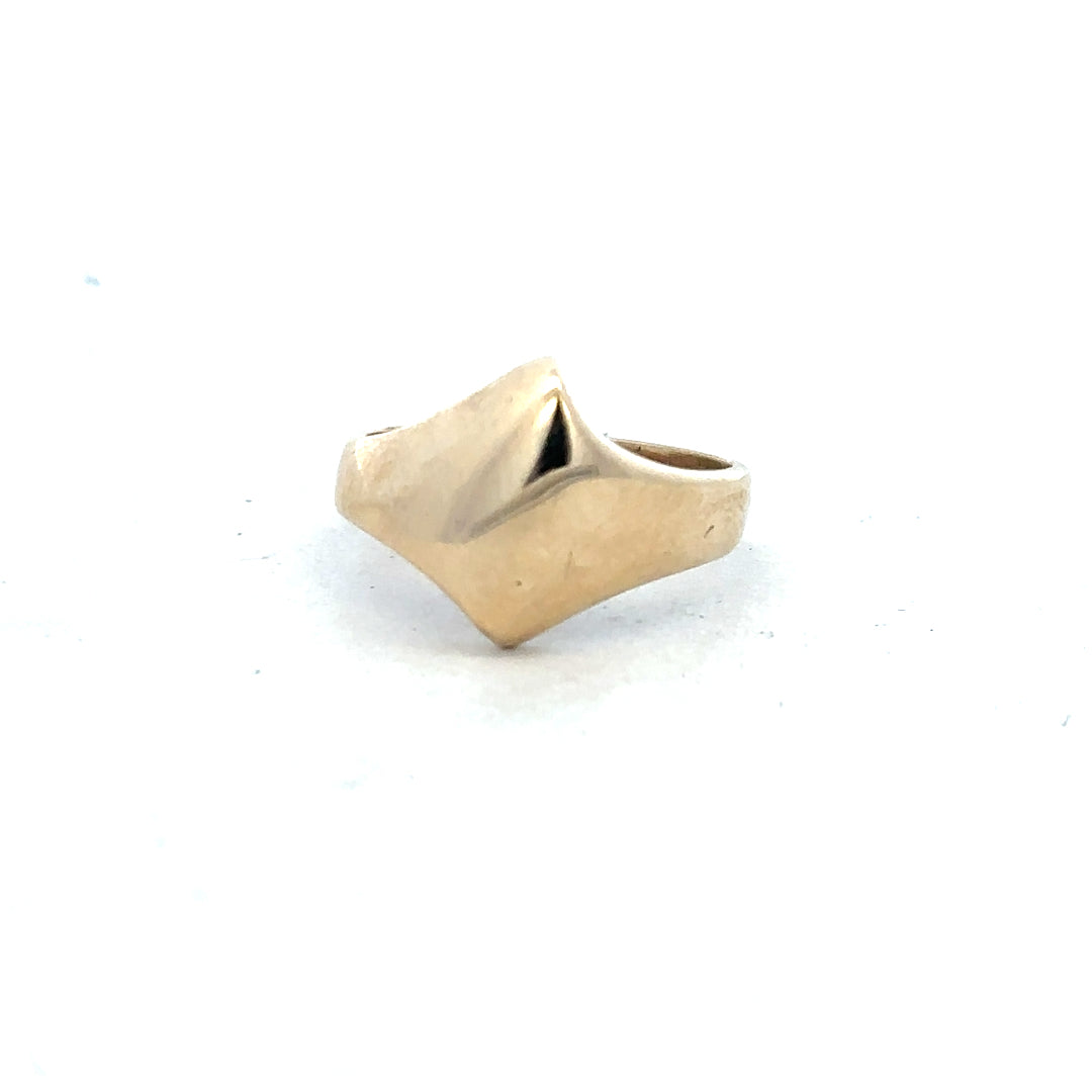 9ct yellow gold ring in size K with a simple band design, unbranded, shown in a close-up image.
