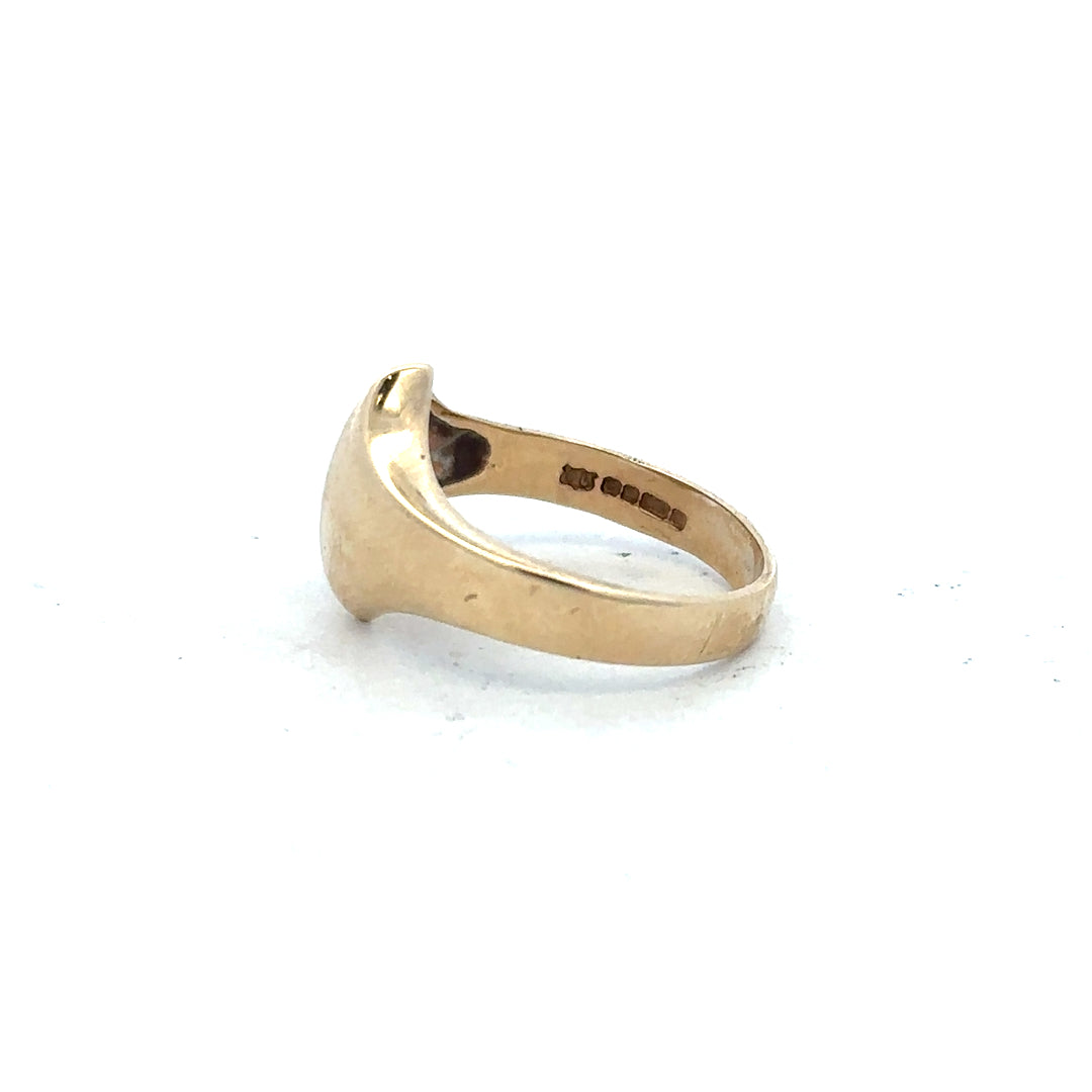 9ct yellow gold ring in size K, featuring a simple band design, unbranded jewelry image.