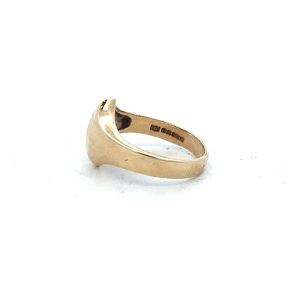 9ct yellow gold ring in size K, featuring a simple band design, unbranded jewelry image.