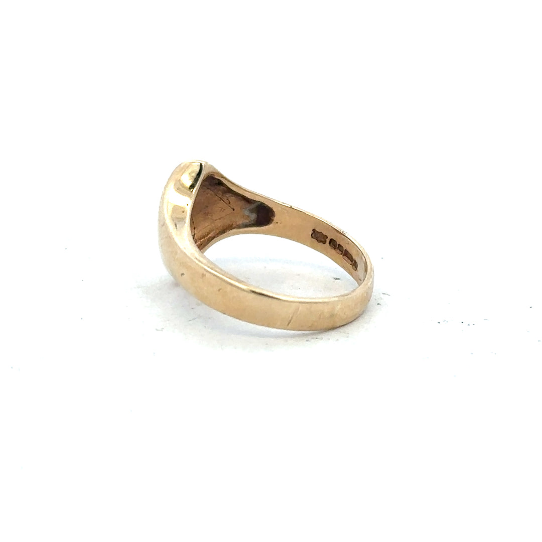 9ct yellow gold ring in size K, unbranded jewelry, showing a smooth polished band with a simple elegant design.