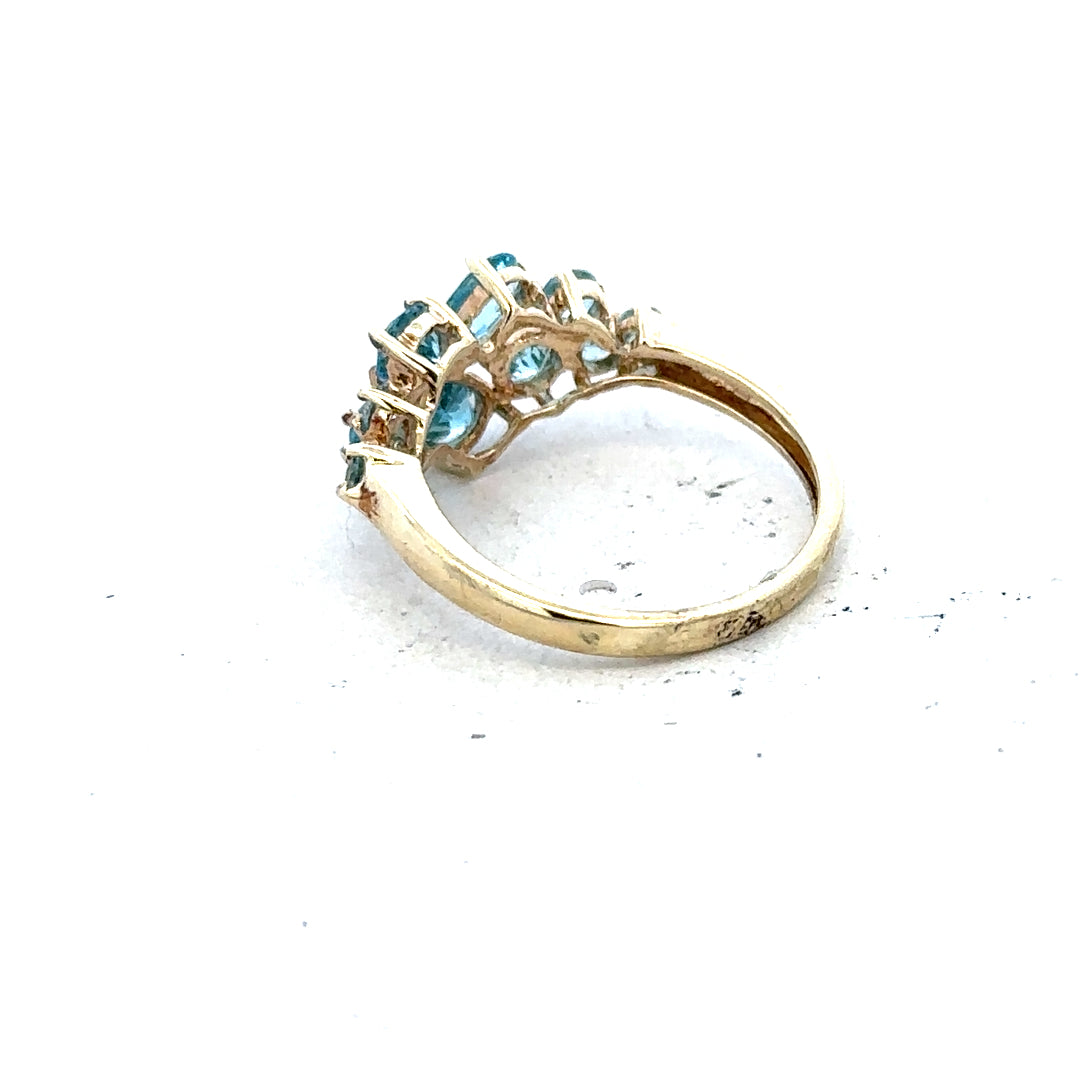 9ct yellow gold ring in size K with a smooth band, unbranded jewelry accessory, shown from a side view.