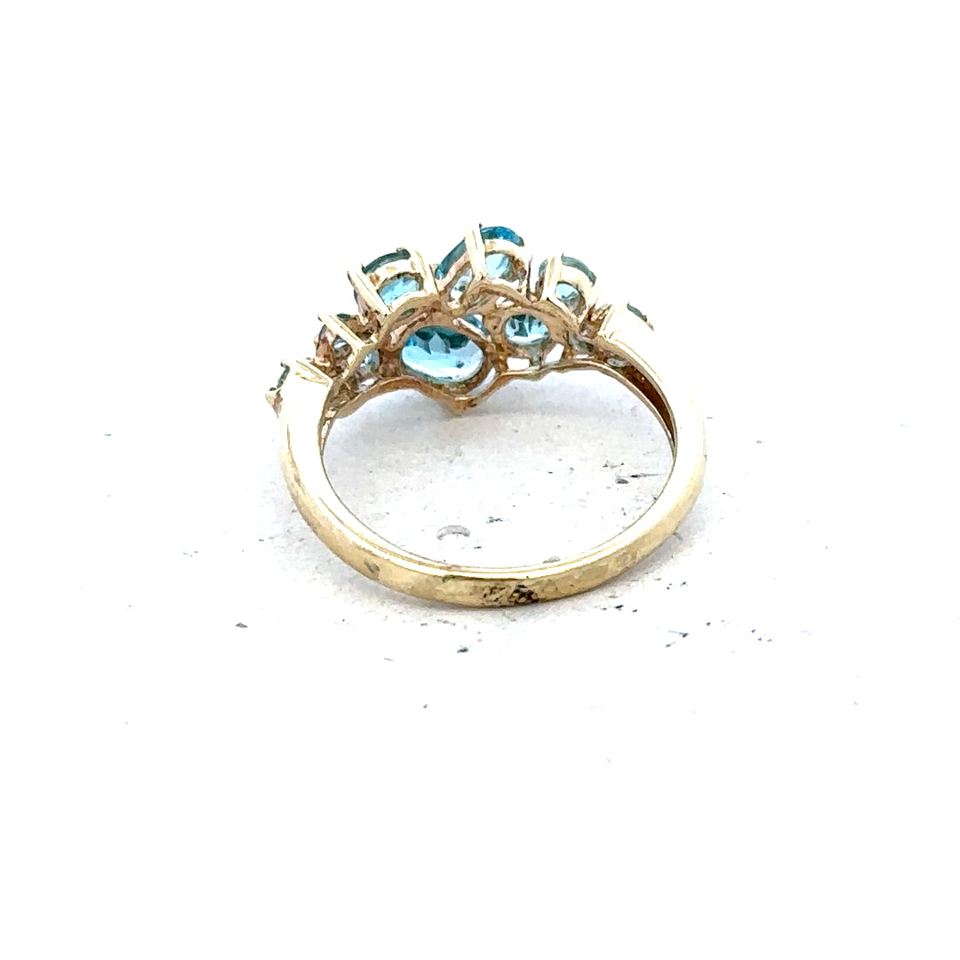 9ct yellow gold ring in size K with a smooth band, unbranded, showcasing its shiny finish and elegant design.