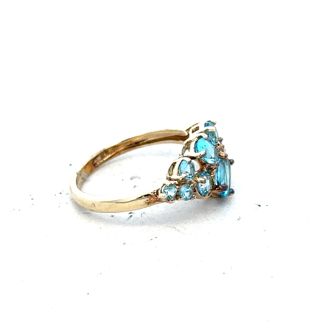 9ct yellow gold ring in size K with a smooth band, unbranded, showcasing a polished finish and simple elegant design.