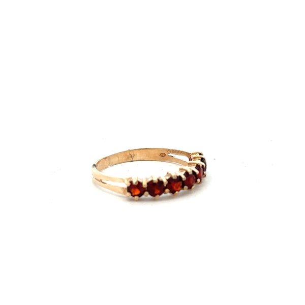 9ct yellow gold ring in size K1/2 with a smooth polished finish, unbranded jewelry, shown from a side view.