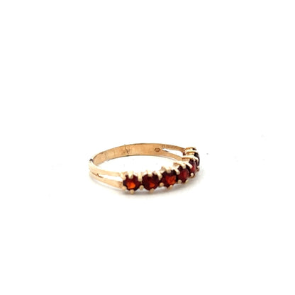 9ct yellow gold ring in size K1/2 with a smooth polished finish, unbranded jewelry, shown from a side view.