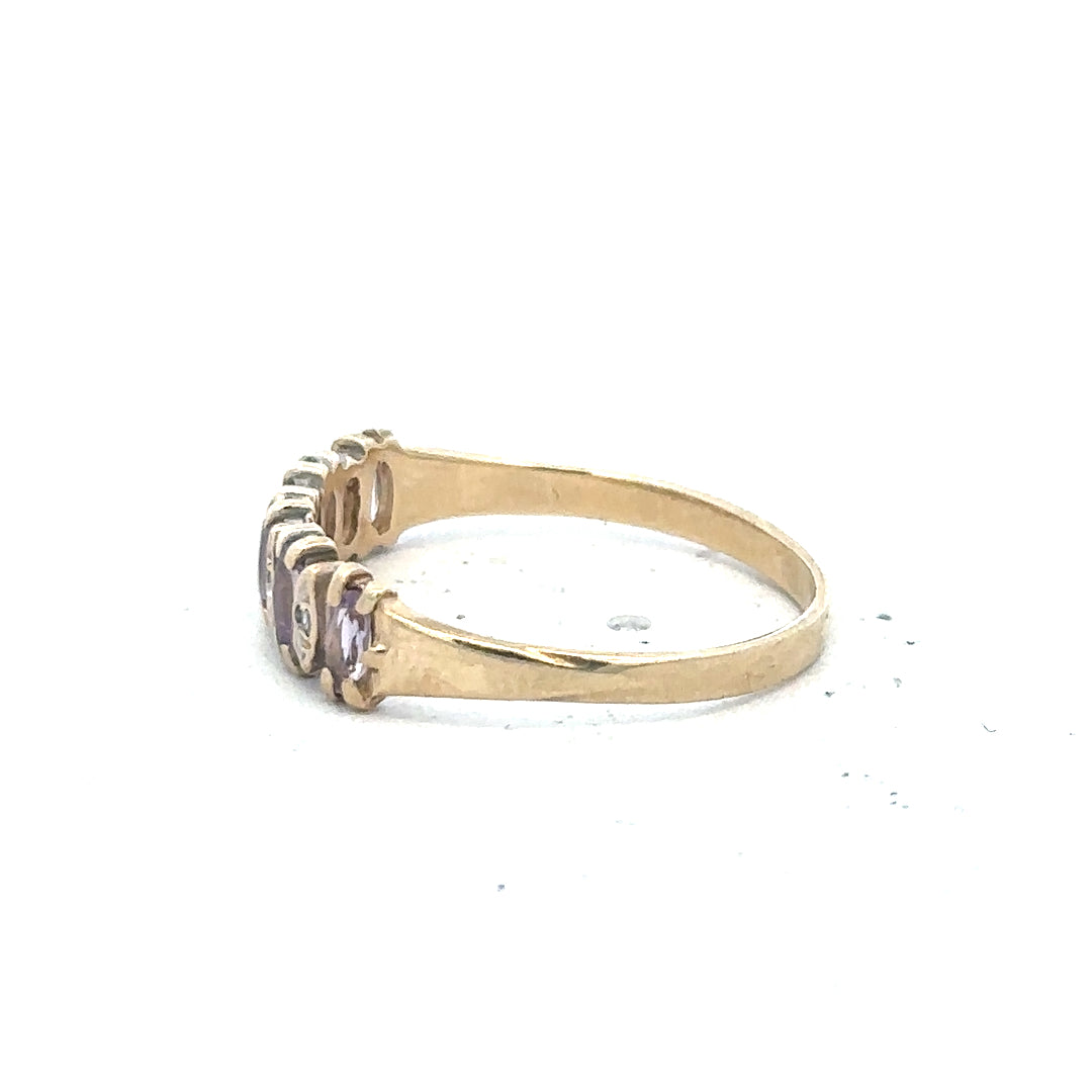 9ct yellow gold ring size K1/2 with a smooth band, unbranded jewelry, shown in a close-up image.