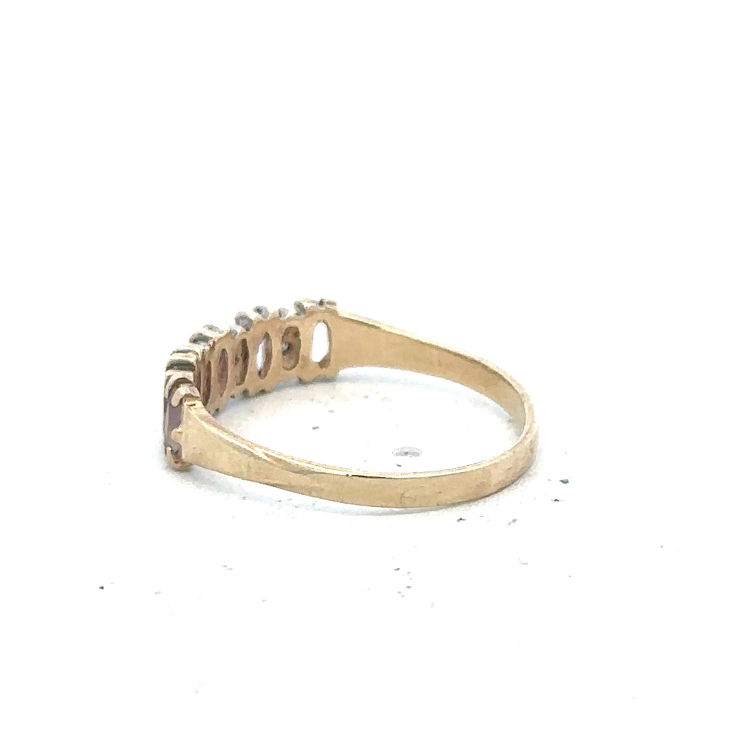 9ct yellow gold ring size K1/2, unbranded, featuring a simple smooth band design, shown in close-up view.