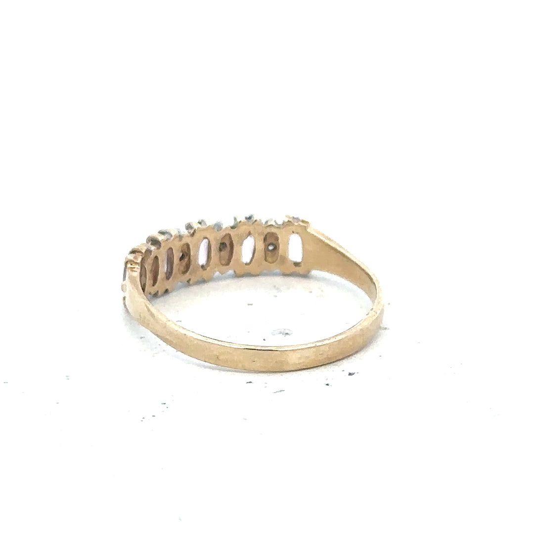 9ct yellow gold ring size K1/2 with a smooth band, unbranded jewelry, showcasing a shiny, polished finish.
