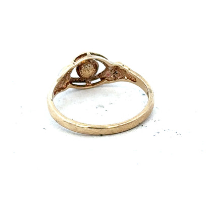 9ct yellow gold ring in size K 1/2 with a smooth polished finish, unbranded jewelry showcasing classic gold band design.