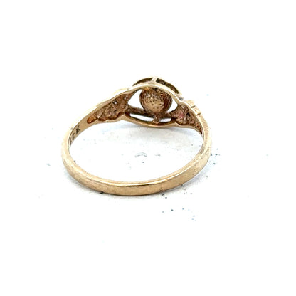 9ct yellow gold ring in size K1/2 with a smooth, polished finish, unbranded jewelry, shown in a detailed close-up image.