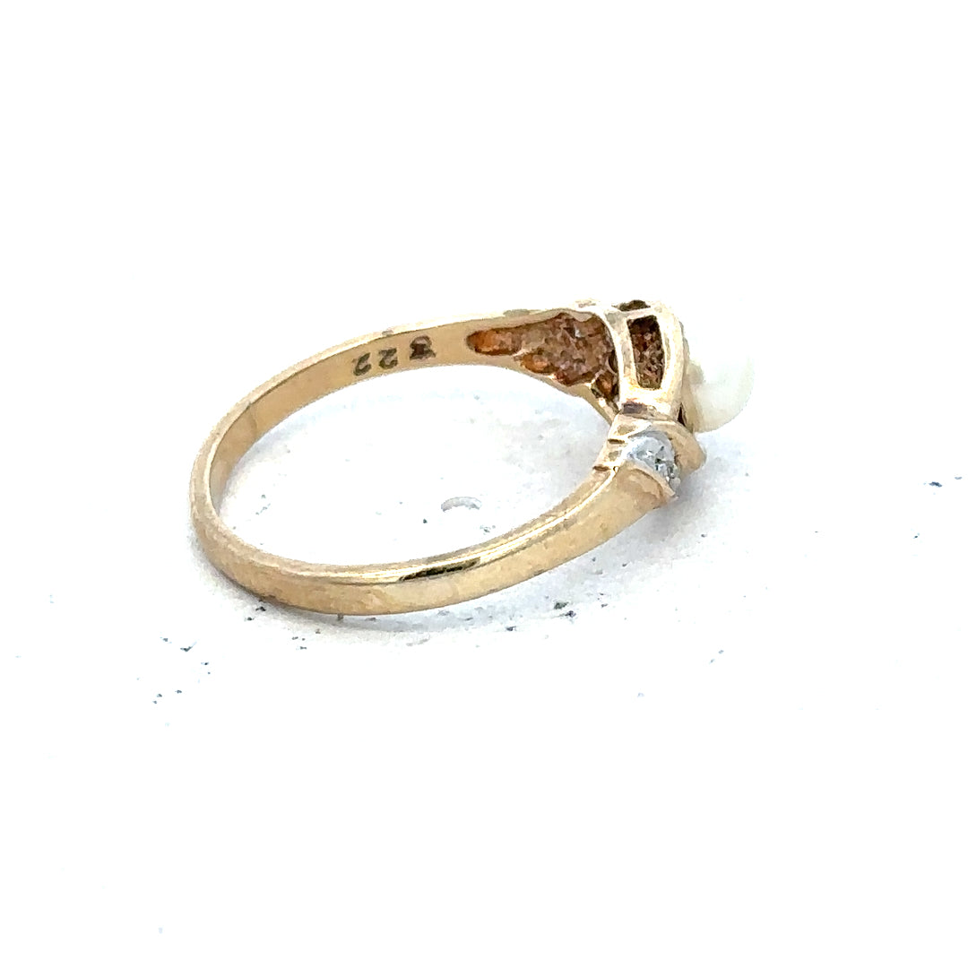 9ct yellow gold ring in size K1/2 with a smooth band, showcasing a classic and elegant jewelry design.