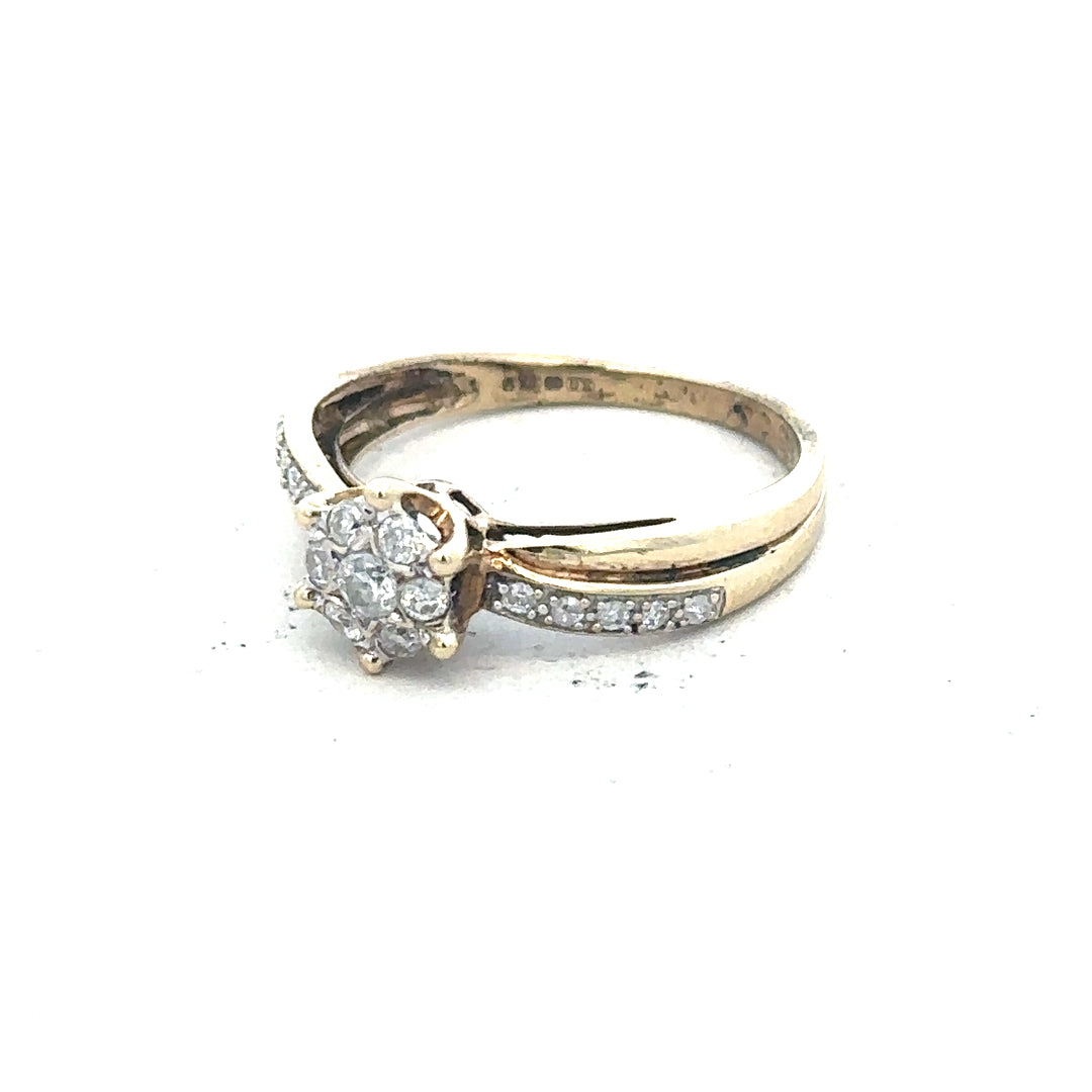 9ct yellow gold ring in size L, unbranded, with a smooth polished band, displayed on a plain background.