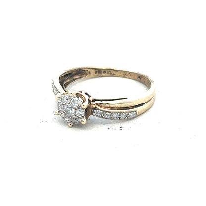 9ct yellow gold ring in size L, unbranded, with a smooth polished band, displayed on a plain background.
