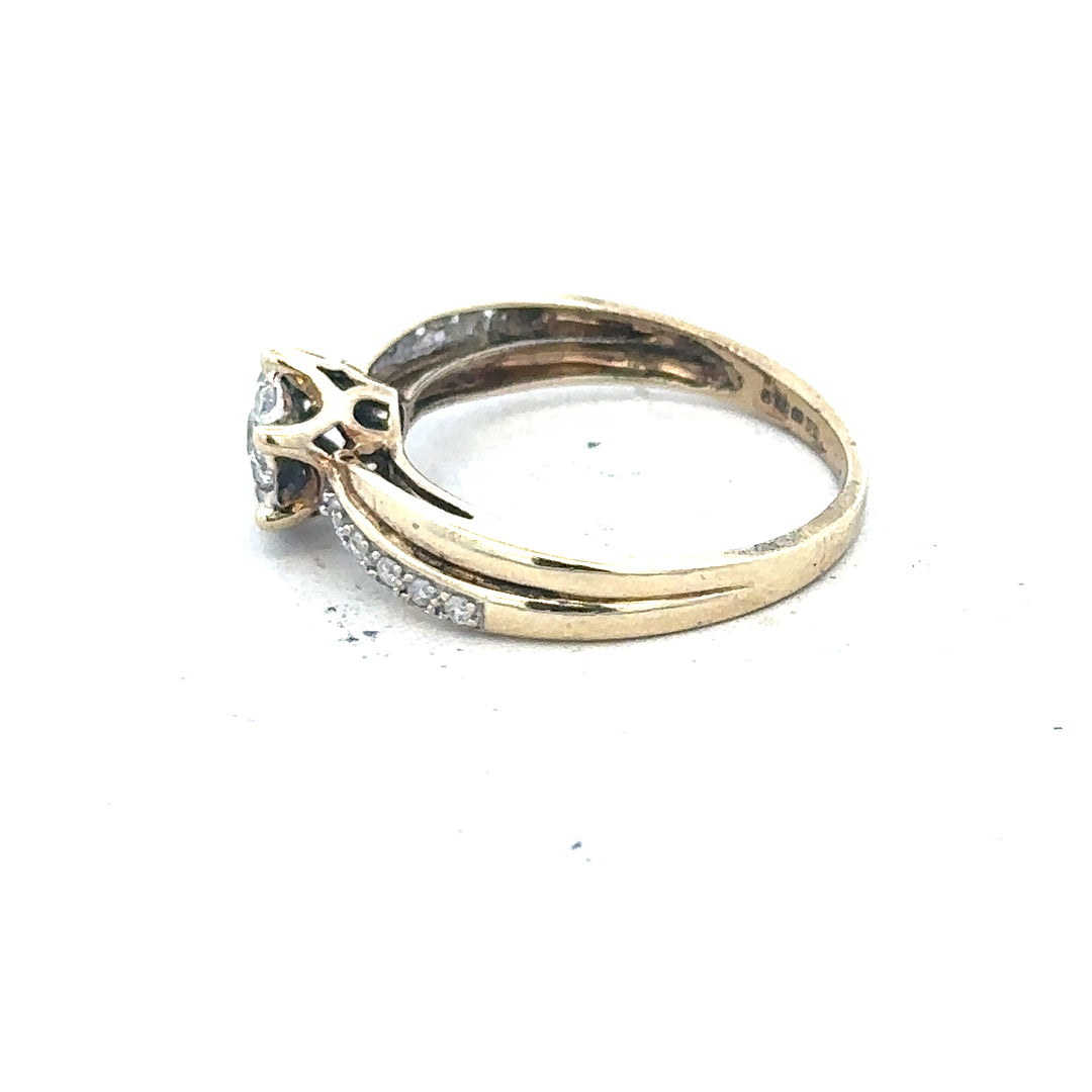 9ct yellow gold ring in size L with a smooth band, unbranded jewelry piece.
