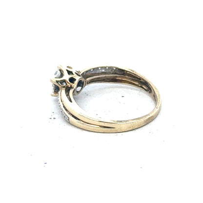 9ct yellow gold ring in size L with a simple band design, unbranded, shiny and polished surface.