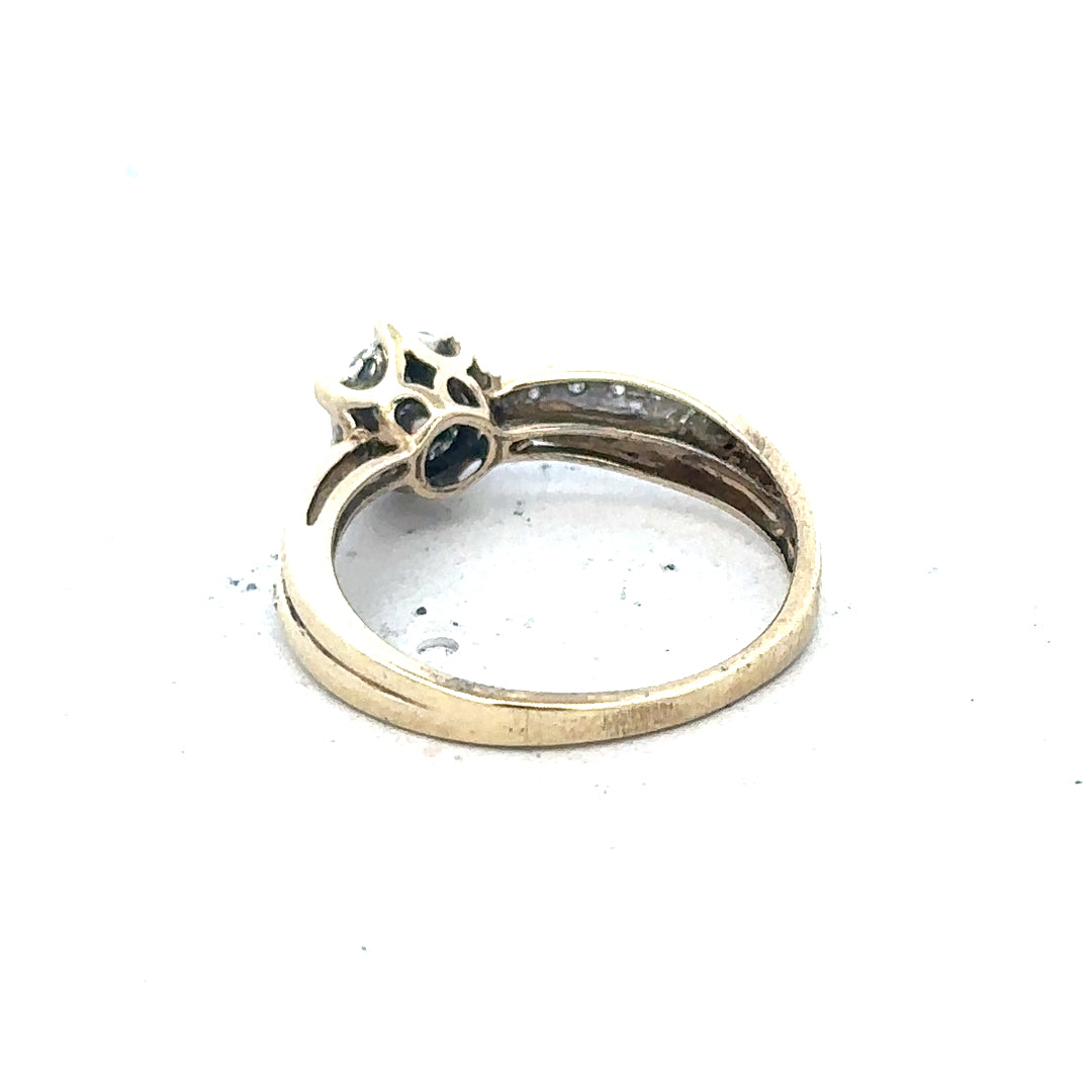 9ct yellow gold ring in size L with a simple band design, unbranded, shown on a plain background.