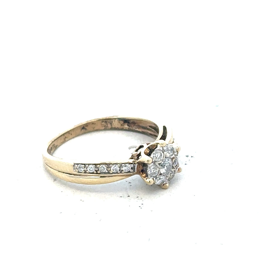 9ct yellow gold ring in size L with a smooth band, unbranded jewelry piece displayed on a neutral background.