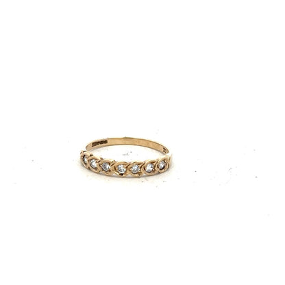 9ct yellow gold ring in size L with a smooth band, unbranded, showcasing a shiny polished finish.