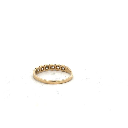 9ct yellow gold ring in size L, unbranded, showcasing a smooth, polished band with a classic design.