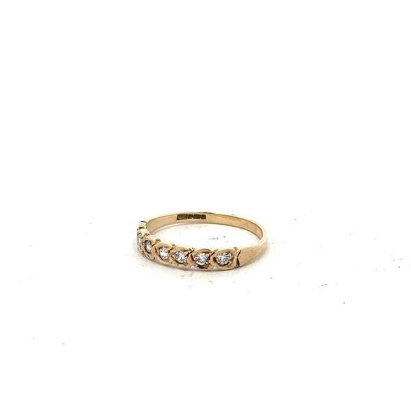 9ct yellow gold ring in size L featuring a smooth, polished band with a simple, elegant design.