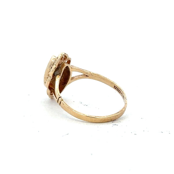 9ct yellow gold ring in size L, unbranded, showing a close-up of the simple, elegant gold band on a white background.