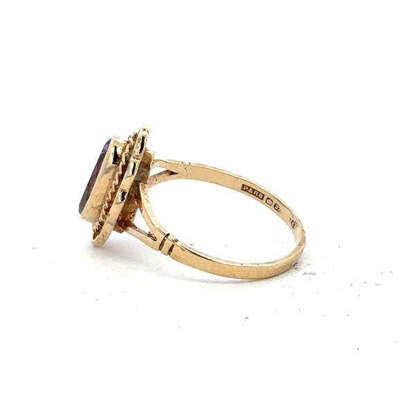 9ct yellow gold ring in size L with a smooth band, unbranded, shown on a plain background.