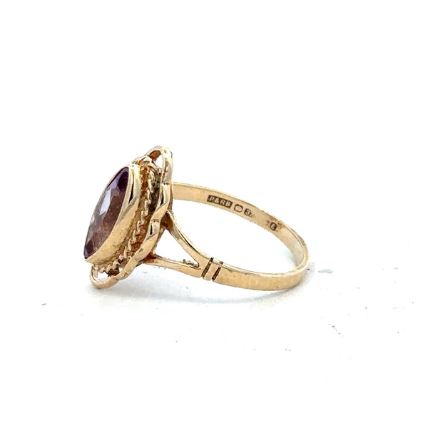 9ct yellow gold ring in size L with a smooth band, unbranded, displayed on a neutral background.