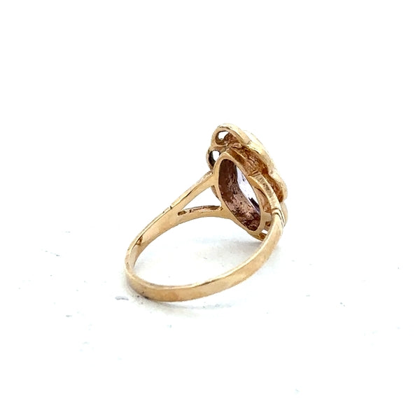 9ct yellow gold ring in size L with a smooth band, unbranded, shown in a close-up view of the jewelry.