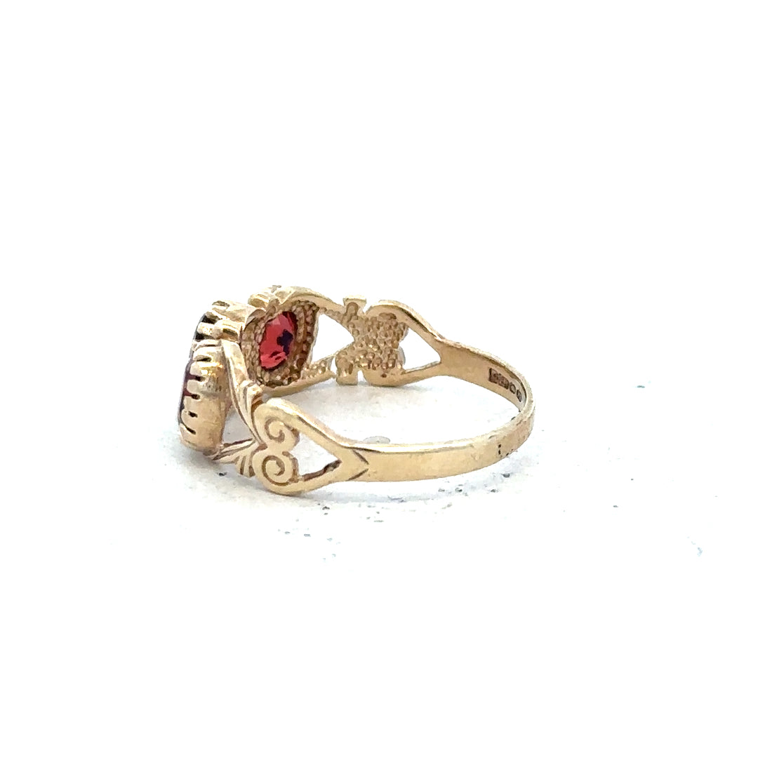 9ct yellow gold ring in size L with a smooth, polished finish, unbranded jewelry suitable for everyday wear.