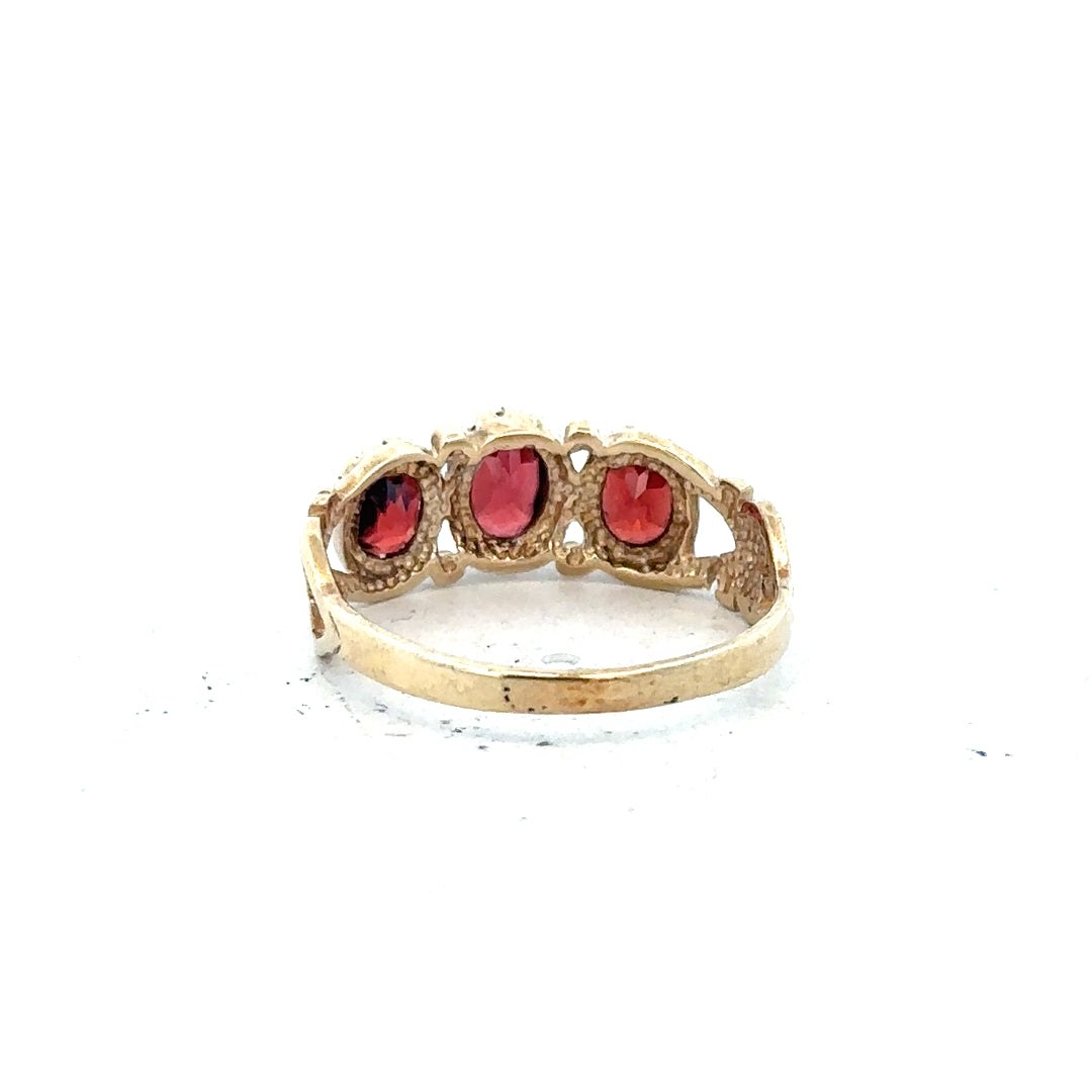 9ct yellow gold ring in size L with a smooth band, unbranded jewelry showcasing a classic design.