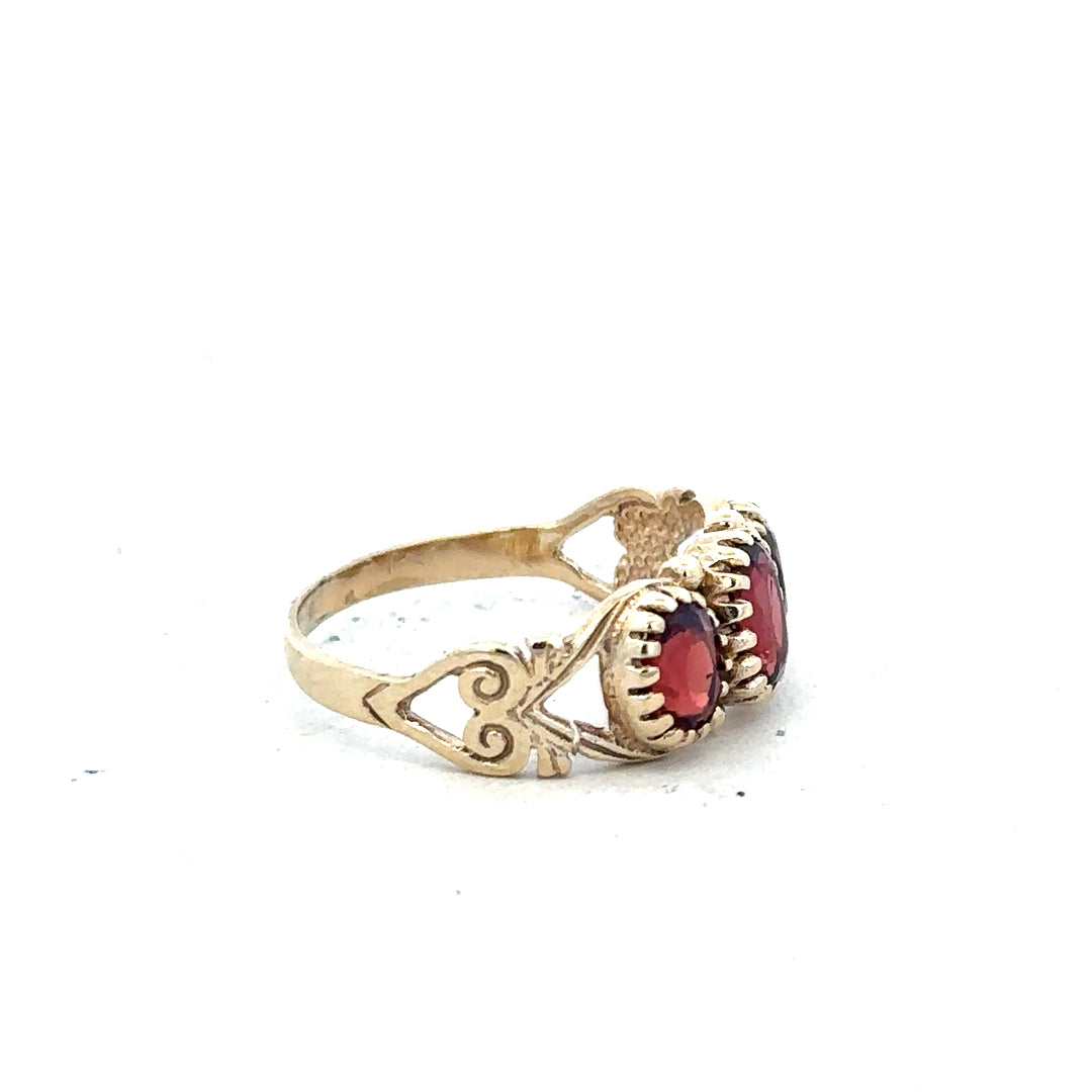 9ct yellow gold ring in size L, featuring a simple smooth band design, unbranded jewelry accessory.