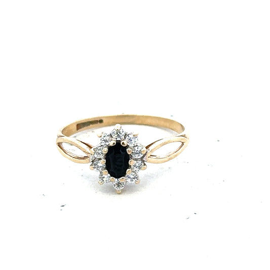 9ct yellow gold ring in size L, unbranded jewelry with a smooth band, displayed on a plain background.